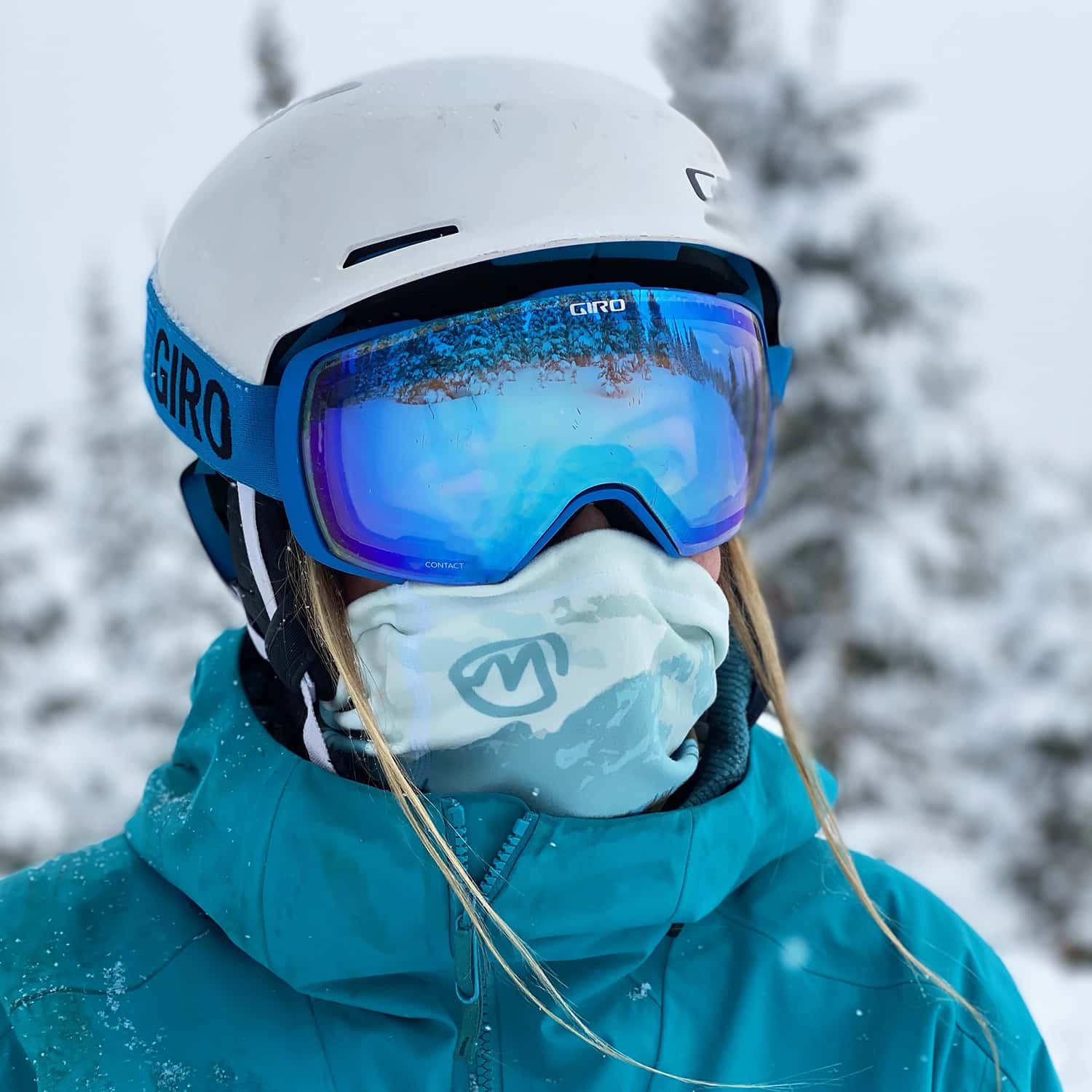 Woman Modeling A Heavyweight Custom Neck Gaiter In Ski Gear